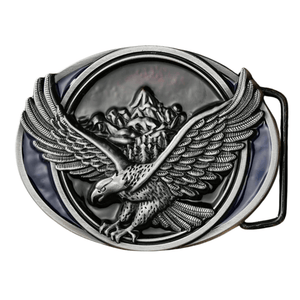 Bältespänne runt med örnmotiv i metall Silver