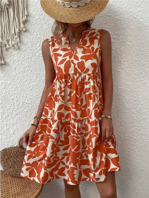 Blommig klänning knälång Orange / S