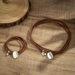 Bohemiskt choker-set i läder med silverhänge Brun och silver