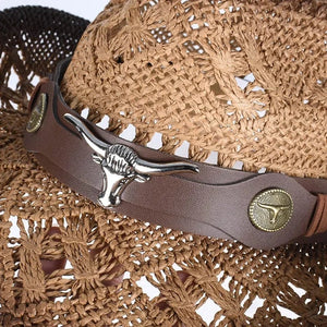 Cowboyhatt i flätad halm med tjurdetalj