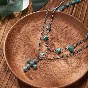 Flerradigt halsbandsset i western stil med turkoskors och choker