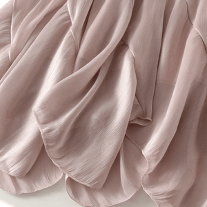 Midikjol med asymmetrisk drapering