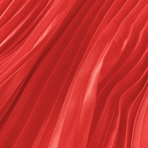 Plisserad satinkjol med rosbård