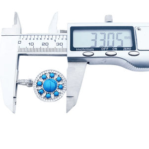 Rund silverberlock med turkos och strass Silver med turkos