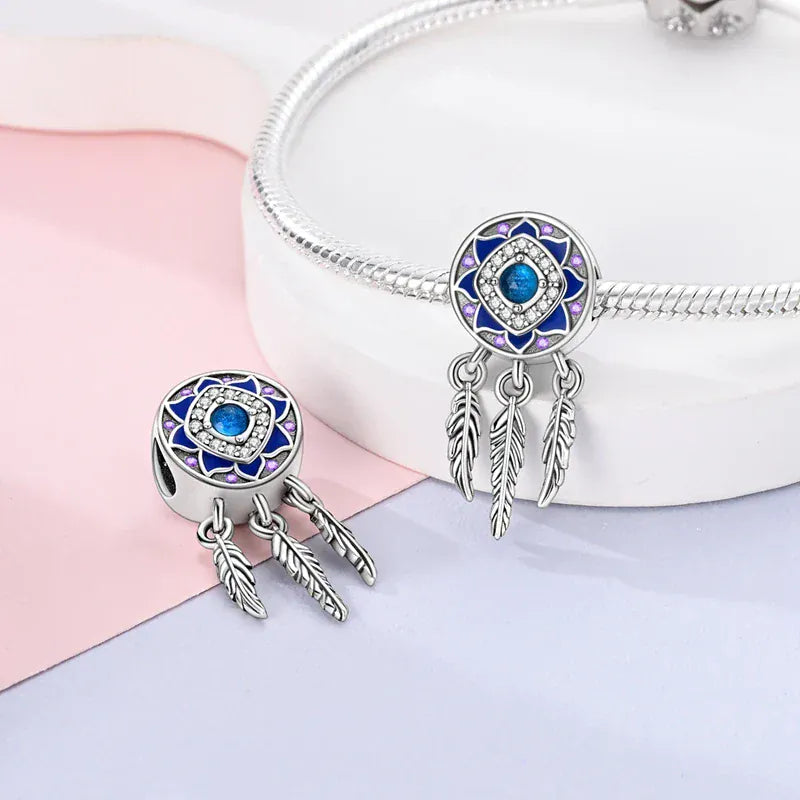 Breloque attrape-rêves bleu en argent