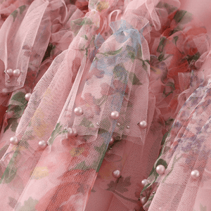 Tyllkjol med blomstermotiv