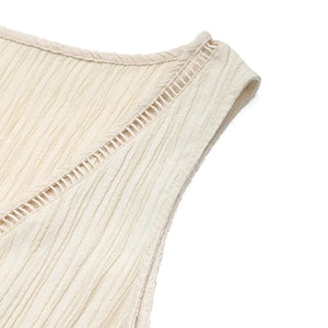Beige klänning med volang