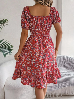 Blommig off-shoulder midiklänning