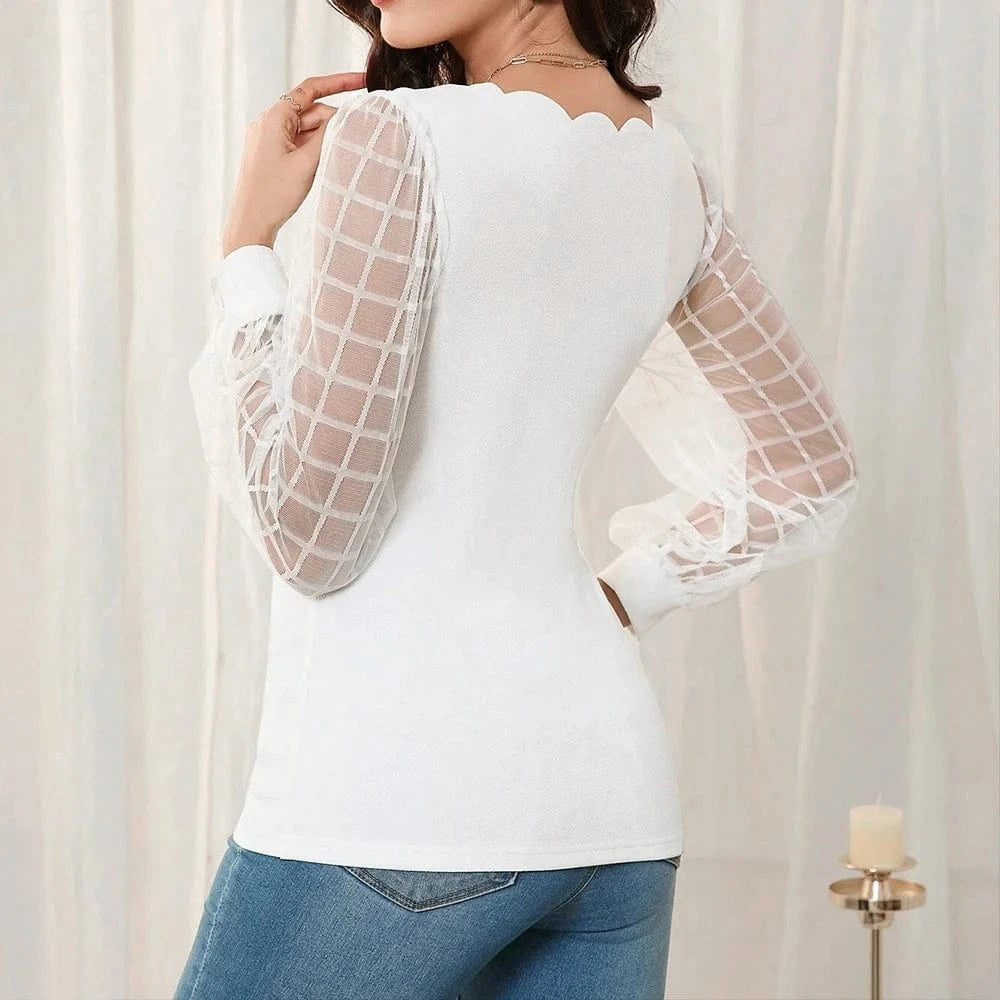 Blus med transparenta rutiga ärmar