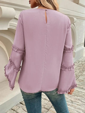Blus med trumpetärm