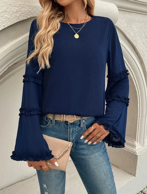 Blus med trumpetärm