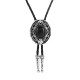 Bolo tie med oval sten och vågformad ram Svart