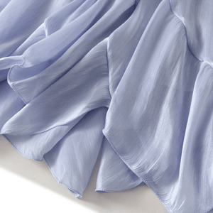 Midikjol med asymmetrisk drapering