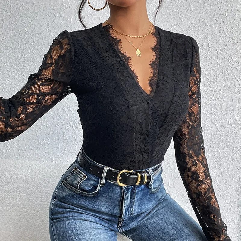 Svart blus i blommig spets